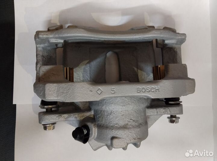 Суппорт (правый)тормозной bosch, Peugeot, Citroen