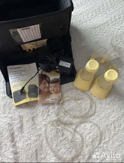 Молокоотсос medela электрический