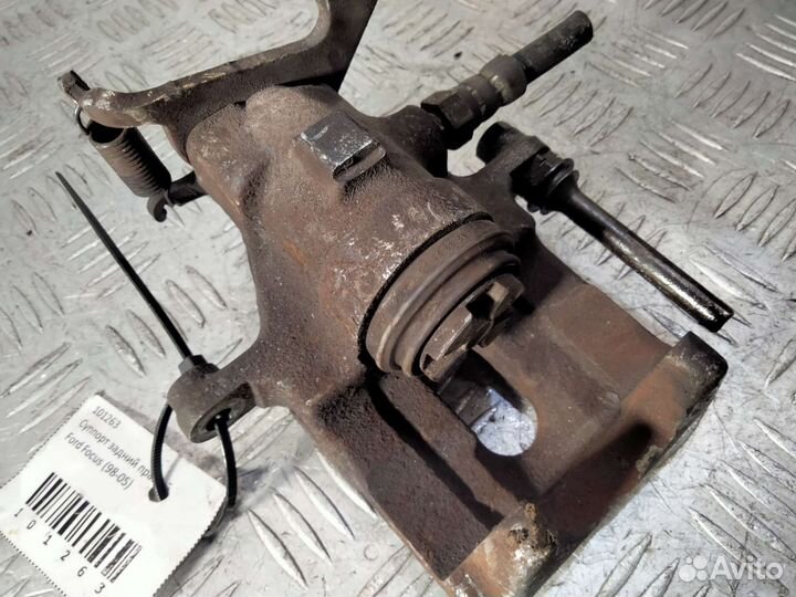 Суппорт задний левый Ford Focus 1