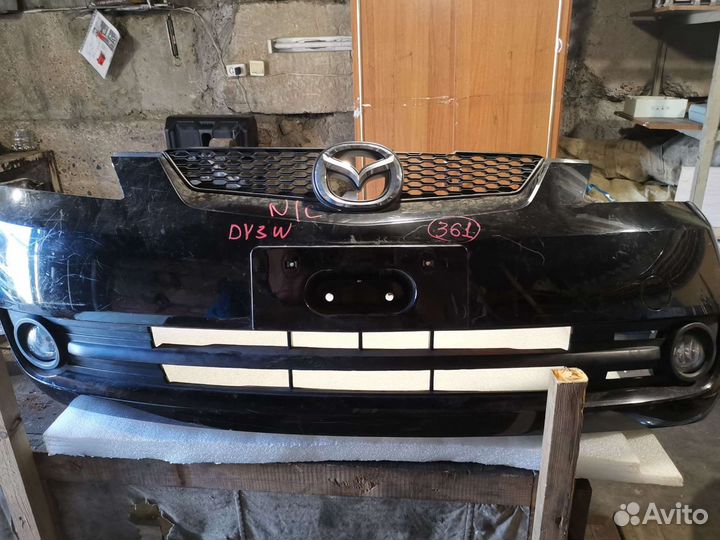 Бампер передний mazda demio DY3W 2 модификации