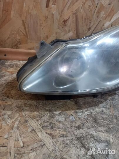 Фара Левая Опель Корса Д 13186381EF