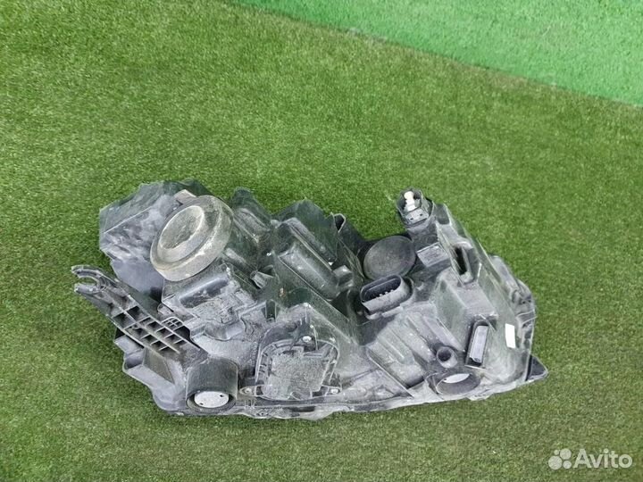 Фара левая Skoda Rapid