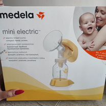 Молокоотсос medela электрический