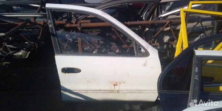 Дверь Toyota Sprinter AE100