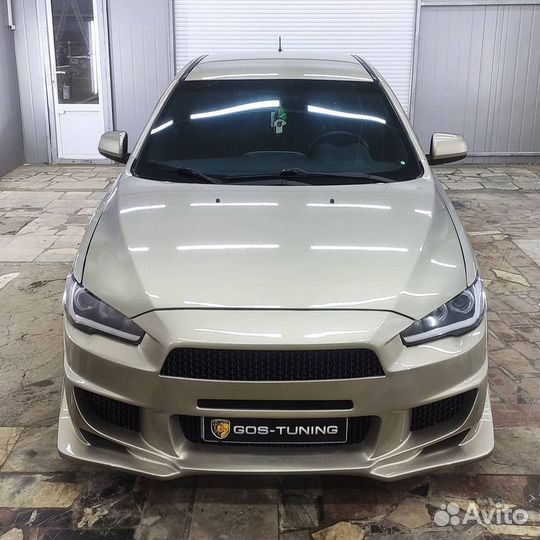 Передний бампер Accolade на Mitsubishi Lancer 10