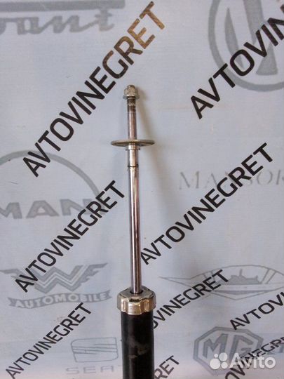 Стойка амортизатор заднего Geely Emgrand EC7