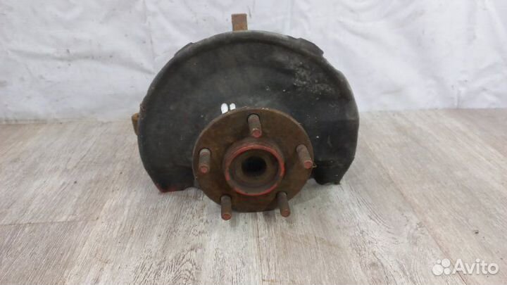 Кулак поворотный передний левый Mitsubishi Lancer