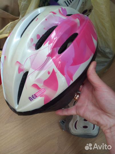 Роликовые коньки