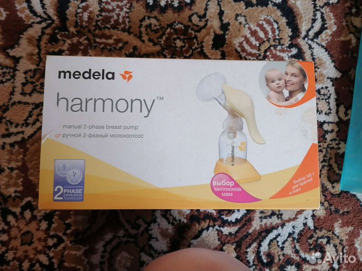 Молокоотсос medela ручной