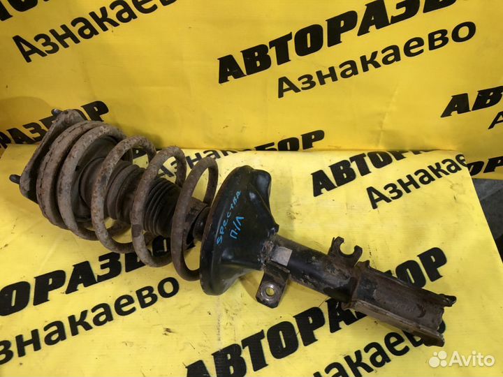 Амортизатор передний левый Kia Spectra