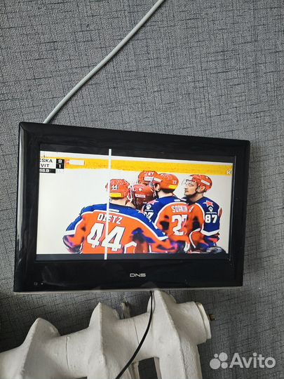 Телевизор DNS E16A20 (с полосой)