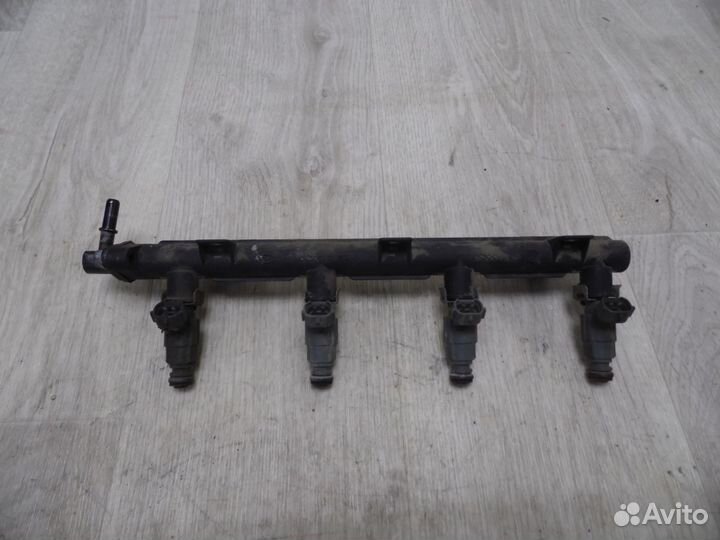 Форсунка инжекторная электрическая Kia Spectra 200