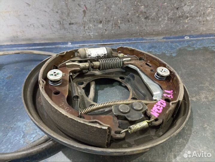 Механизм ручника задний левый Toyota Corolla E120