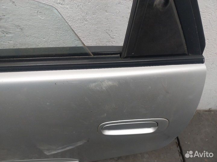 Дверь левая задняя Toyota Corolla E11