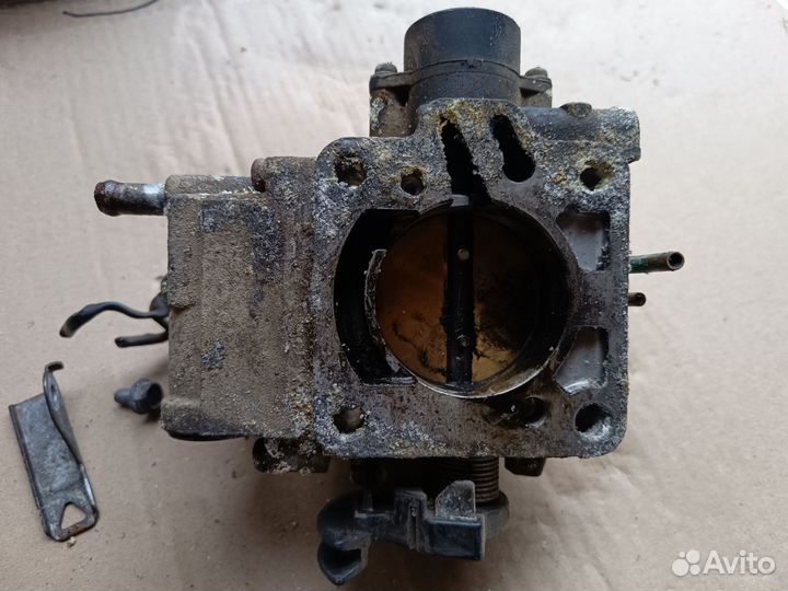 Дросельная заслонка lancer 9 4g18