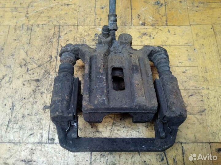 Суппорт задний правый Nissan Pathfinder R51