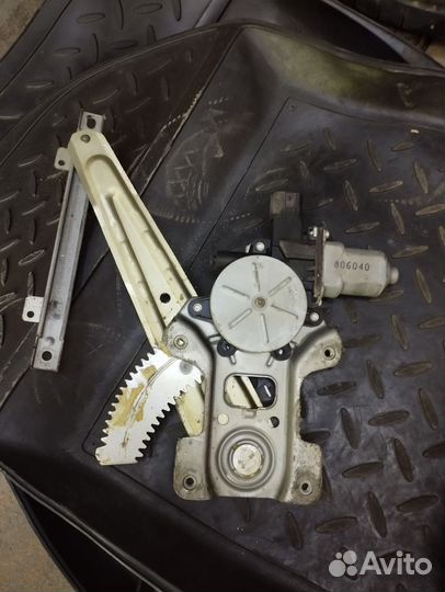 Стеклоподъёмник задний левый Mitsubishi lancer 10