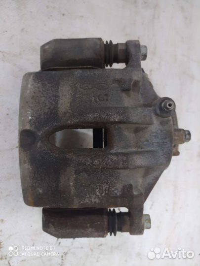 Суппорт левый передний Хендай IX 35 2011