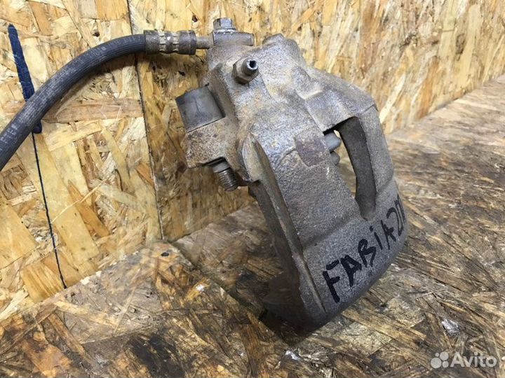 Суппорт тормозной передний правый Skoda Fabia 2