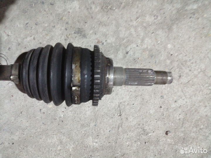 Полуось передняя левая (приводной вал, шрус) Mazda