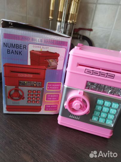 Игрушка новая копилка сейф