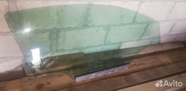 Стекло двери передней правой Opel Astra