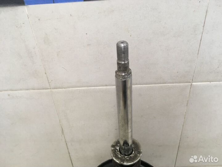 Амортизатор передний левый Carina E 1992-1997