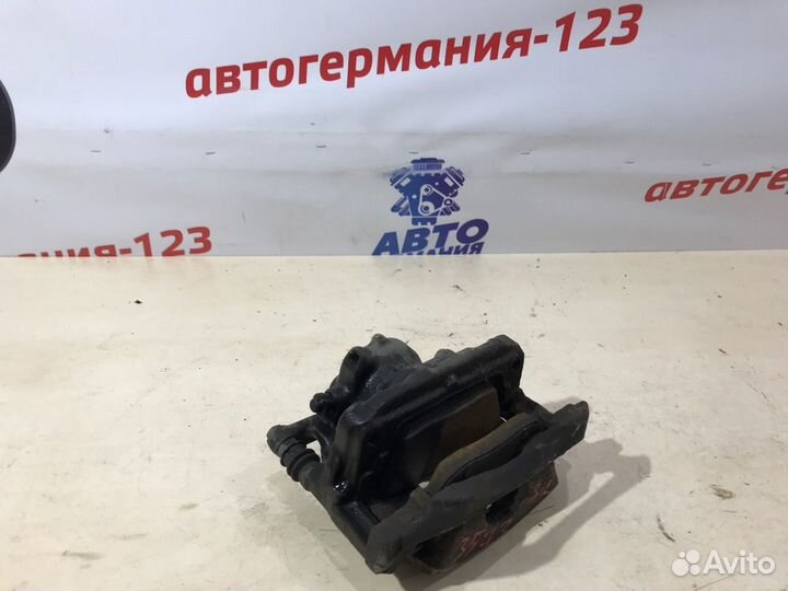 Суппорт тормозной задний левый Mercedes Gla180