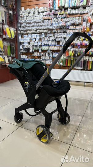 Коляска автокресло doona с базой isofix