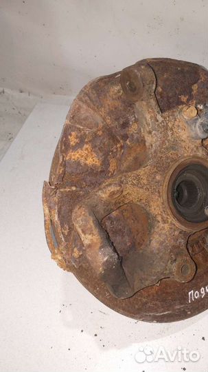 Поворотный кулак перед Mitsubishi Pajero Sport