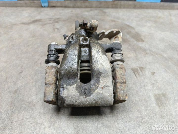 Суппорт задний левый Opel Astra H (3D) 1.6 Z16XER