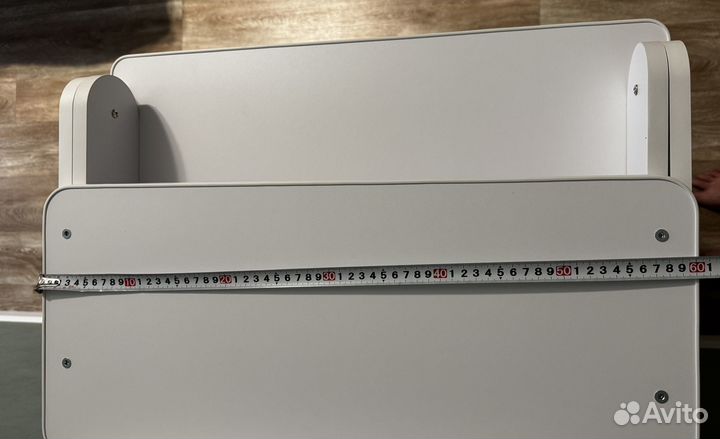 Пеленальный комод белого цвета на колёсиках