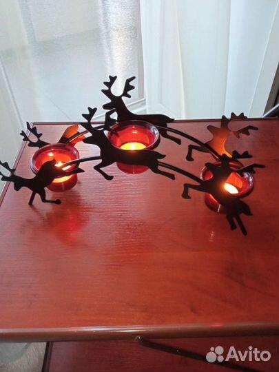 Подсвечник бегущие олени на три свечи