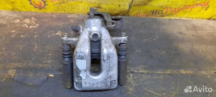 Супорт тормозной задний левый Peugeot 307