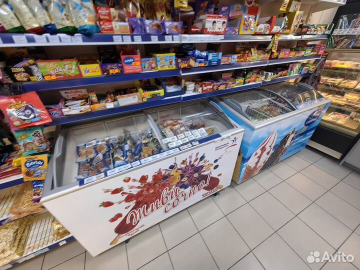 Продуктовый магазин в многоэтажном доме