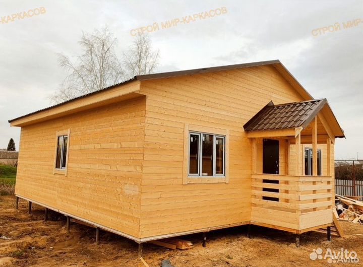 Дачный дом 10х10м с террасой и коыльцом