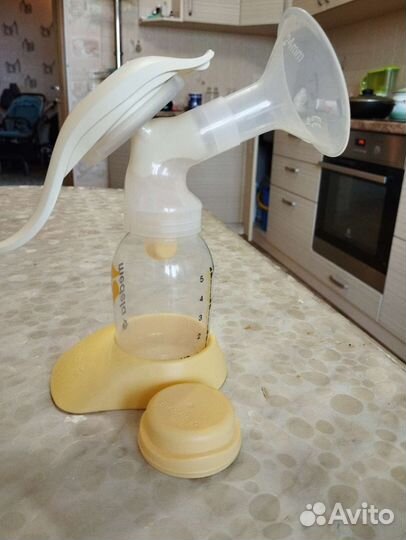 Молокоотсос medela ручной