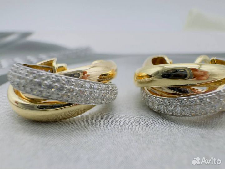 Золотые серьги cartier triniti