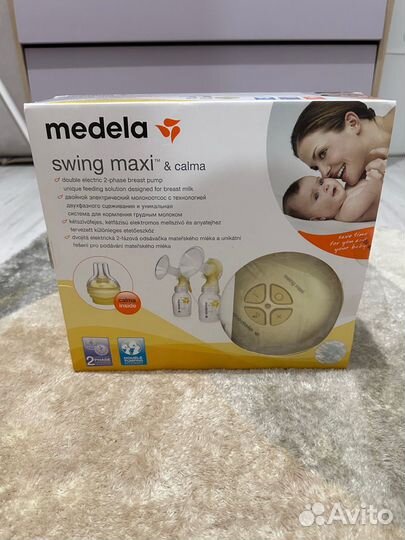 Молокоотсос электрический medela swing maxi