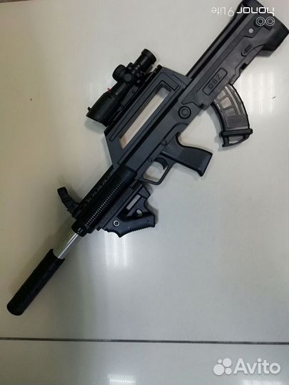 Игрушечный пластиковый автомат на пульках