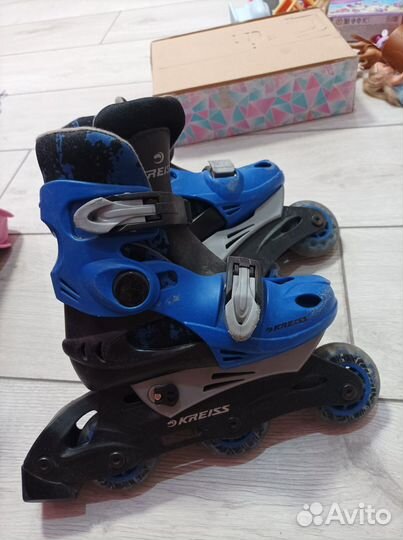 Роликовые коньки