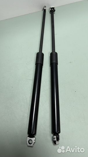 Амортизатор багажника BMW E34