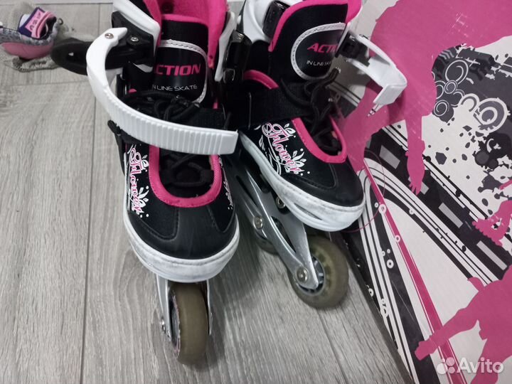 Роликовые коньки