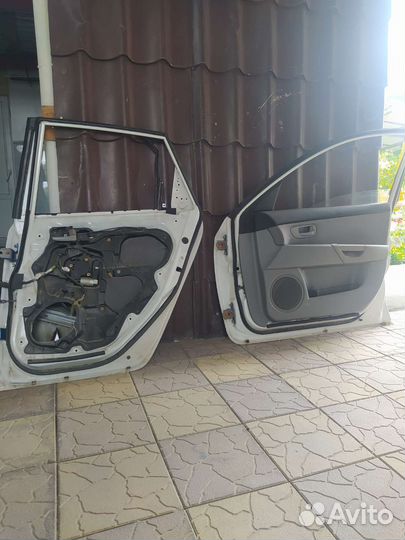 Двери на mazda 3 хэтчбек