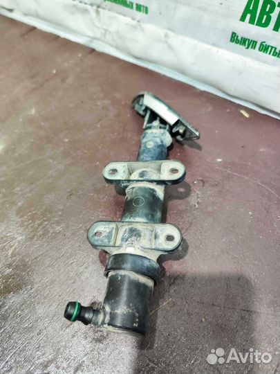 Форсунка омывателя фар левая Skoda Superb 2