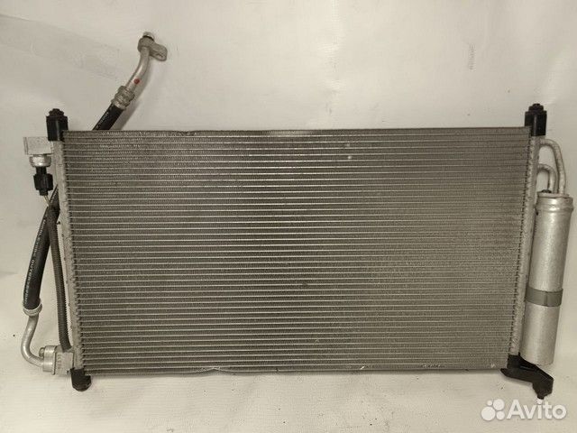Радиатор кондиционера Nissan Tiida