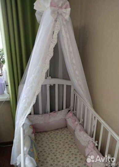 Кроватка с продольным маятником