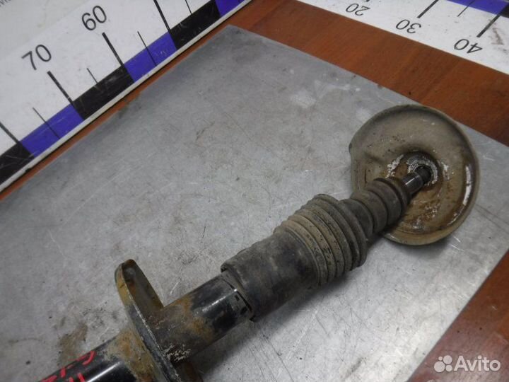 Амортизатор передний левый Nissan Almera G15 K4M