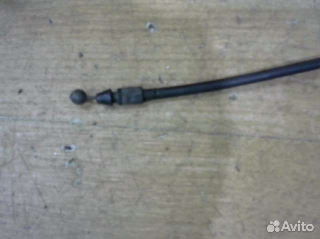 Трос капота Kia Carnival 1