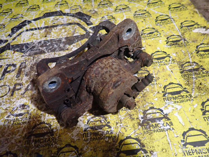 Суппорт передний левый Chevrolet Lacetti